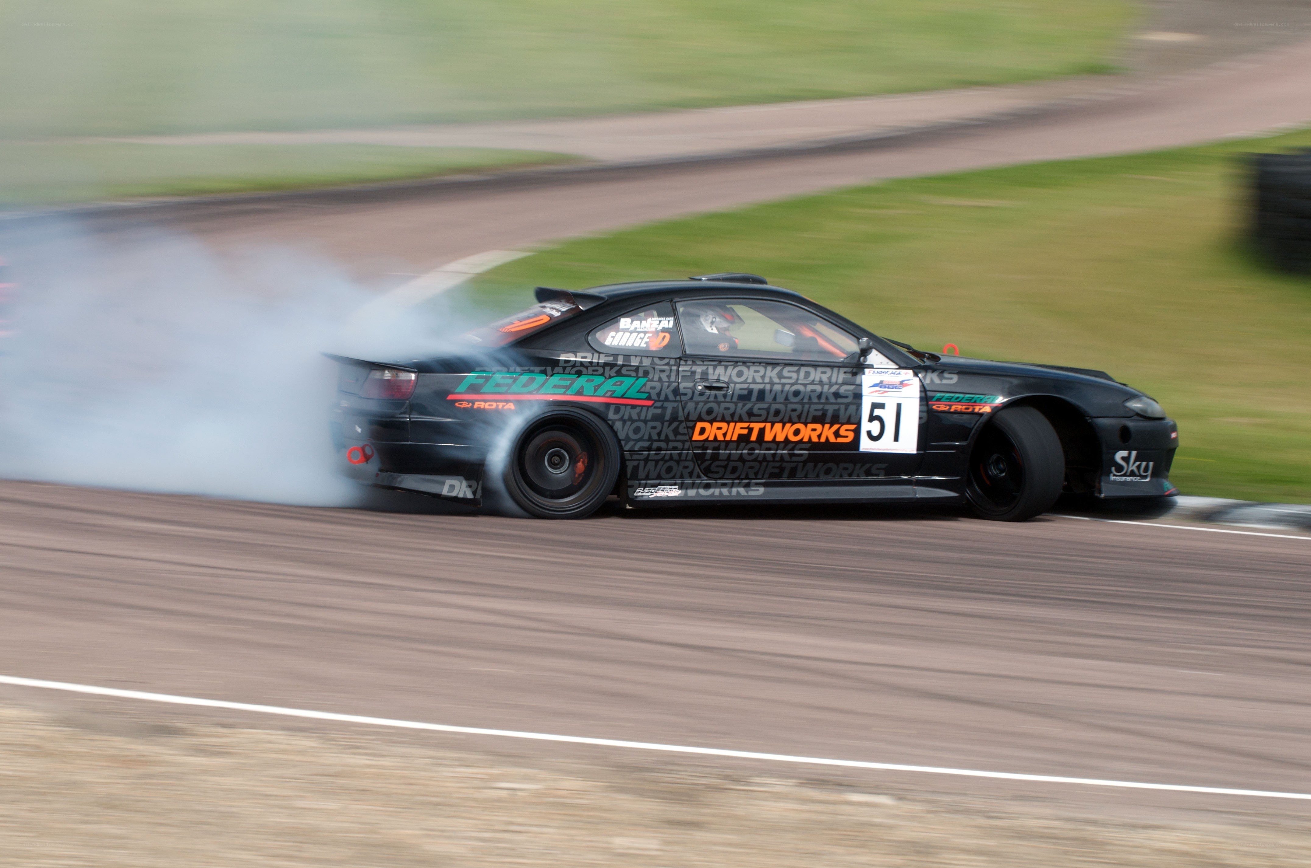 drifting race car on track