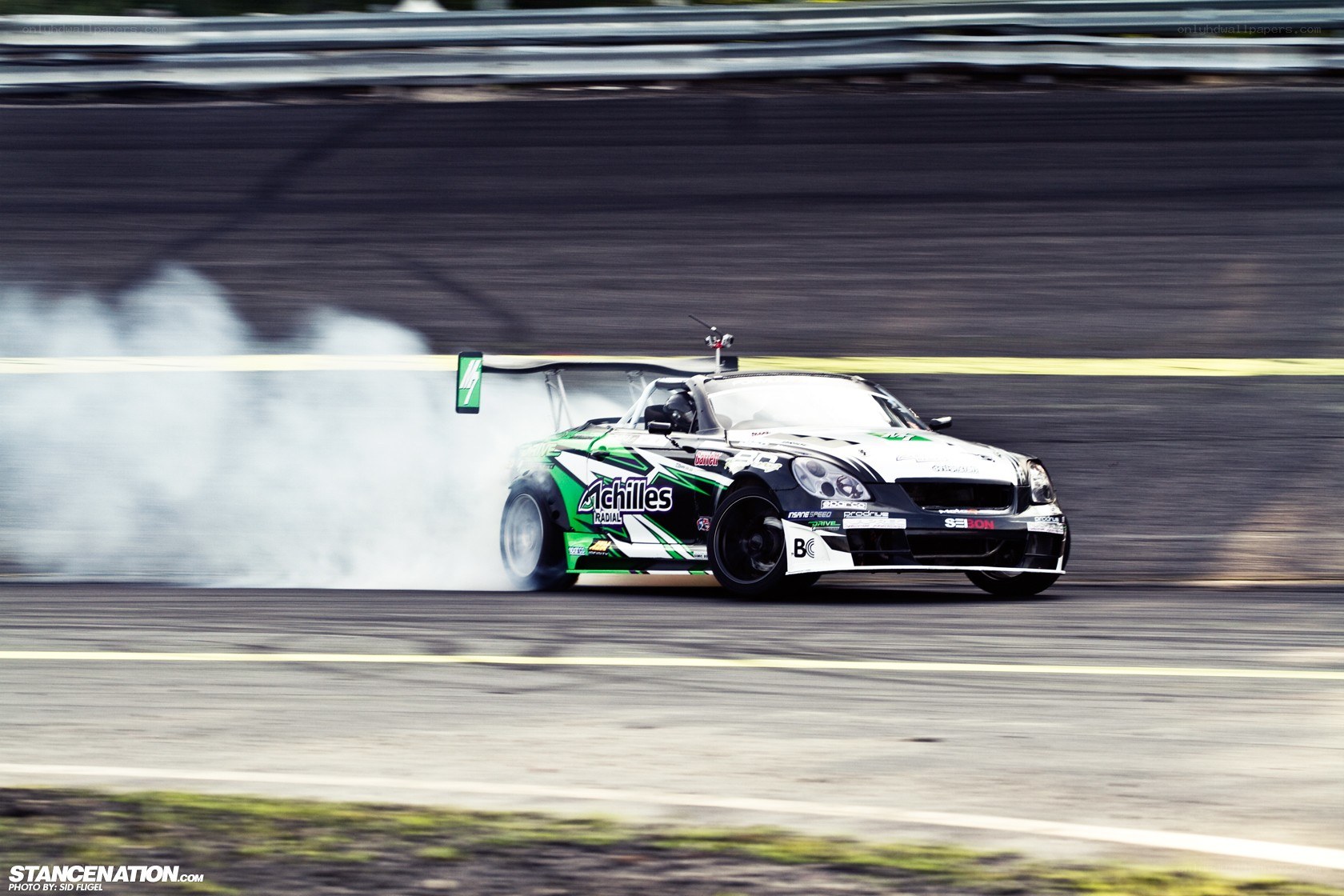 Drifting race car on track