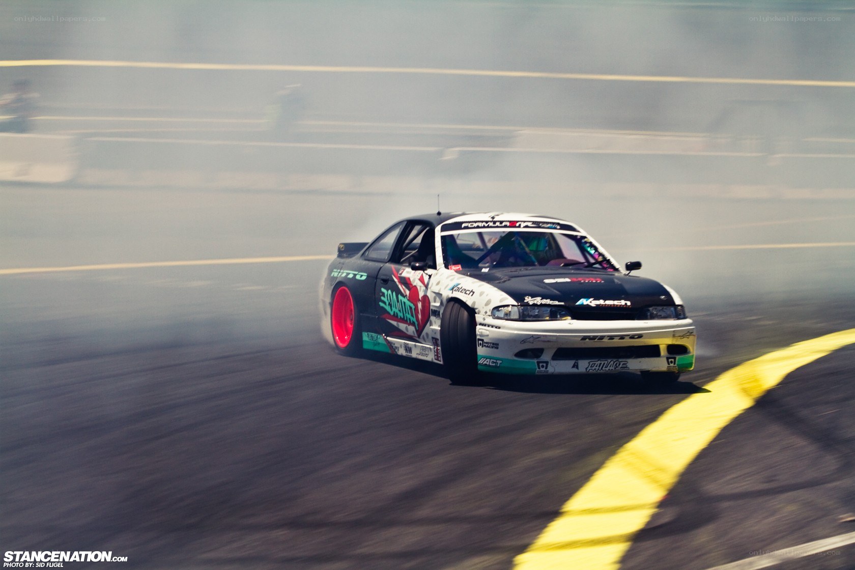 drifting race car on track