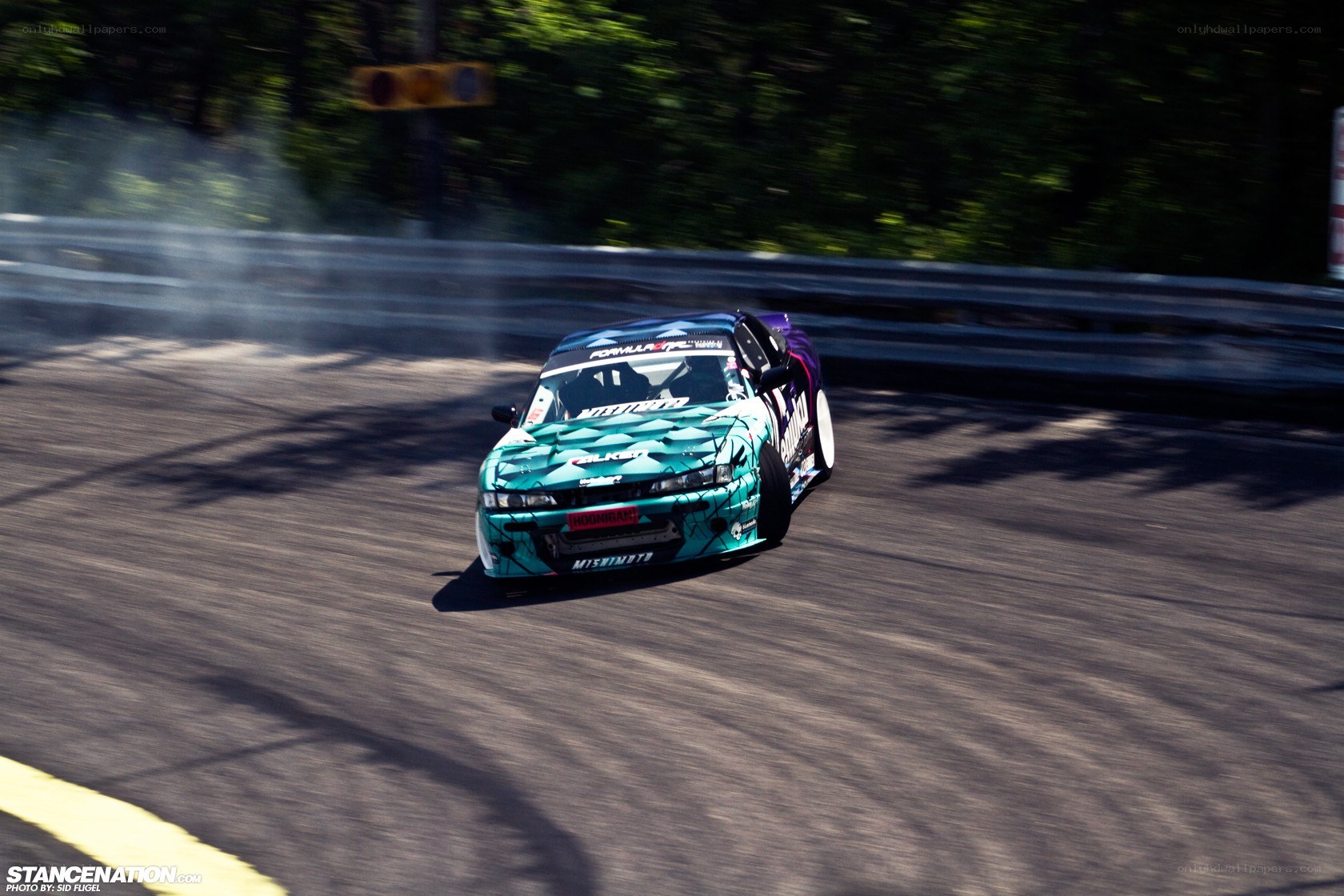 Drifting race car on track