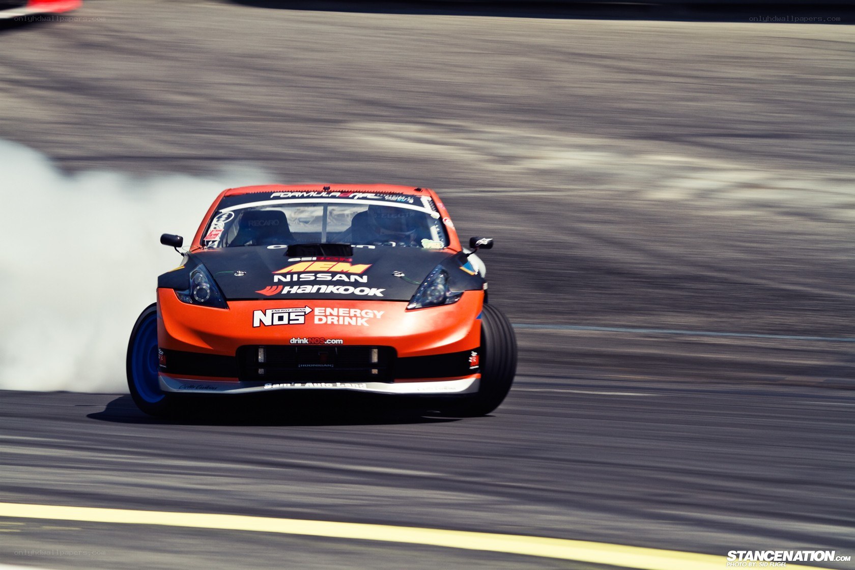 Drifting race car on track