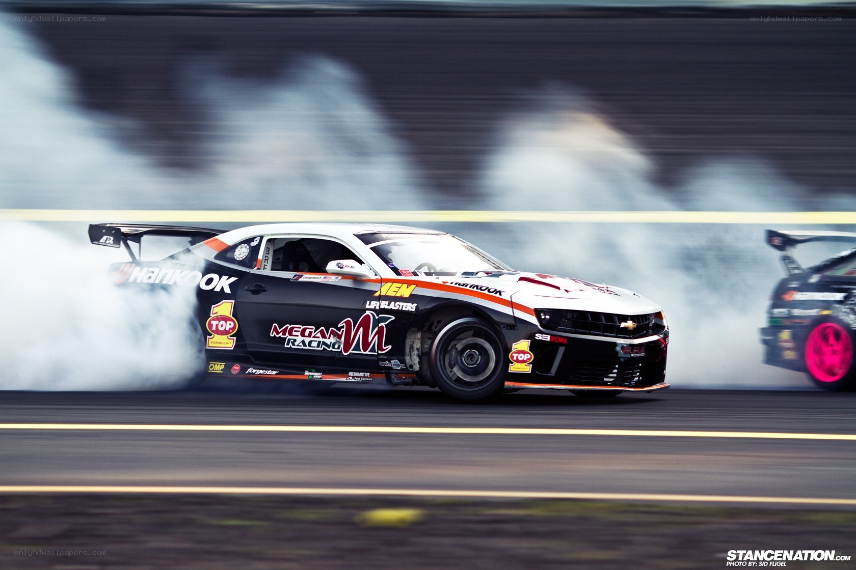 Drifting race car on track