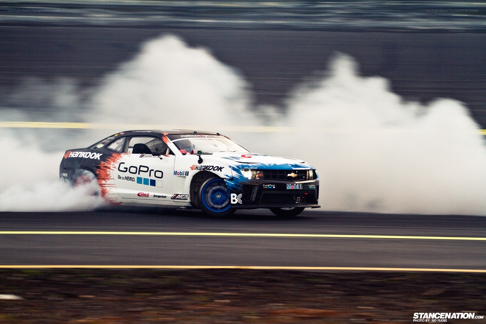 Drifting race car on track