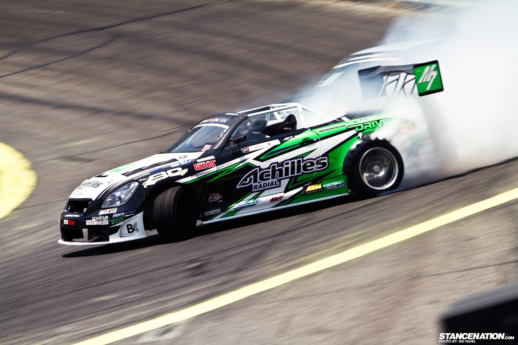 Drifting race car on track