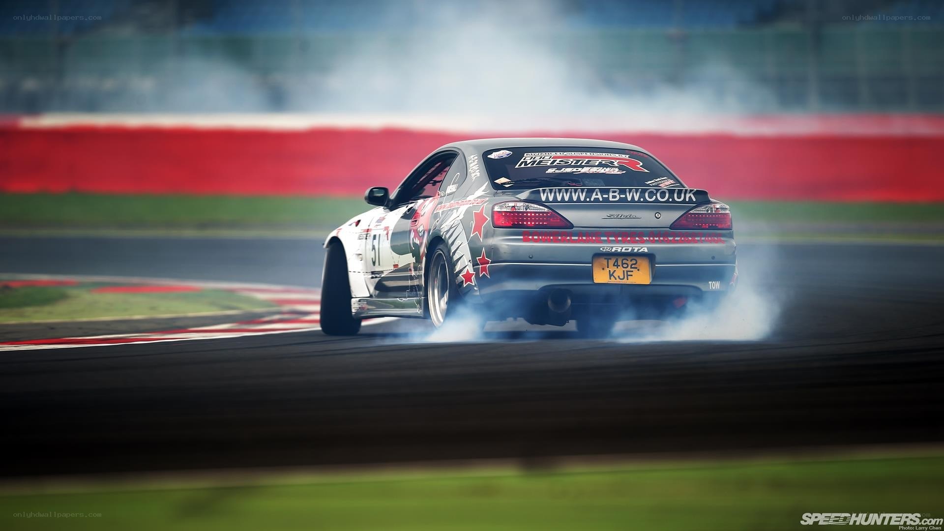 drifting race car on track