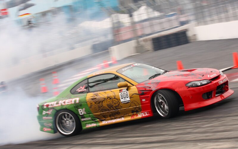 Drifting Race Car — Red, Dynamic, Afternoon, Photograph, Smoke