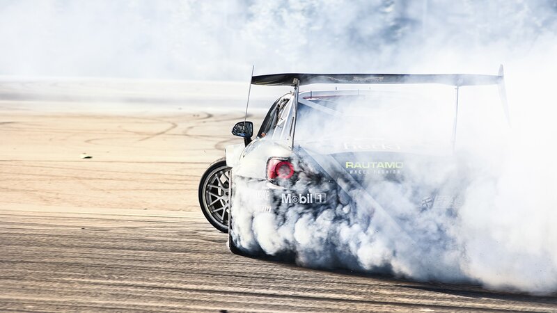 Drifting Race Car — White, Dramatic, Afternoon, Photograph
