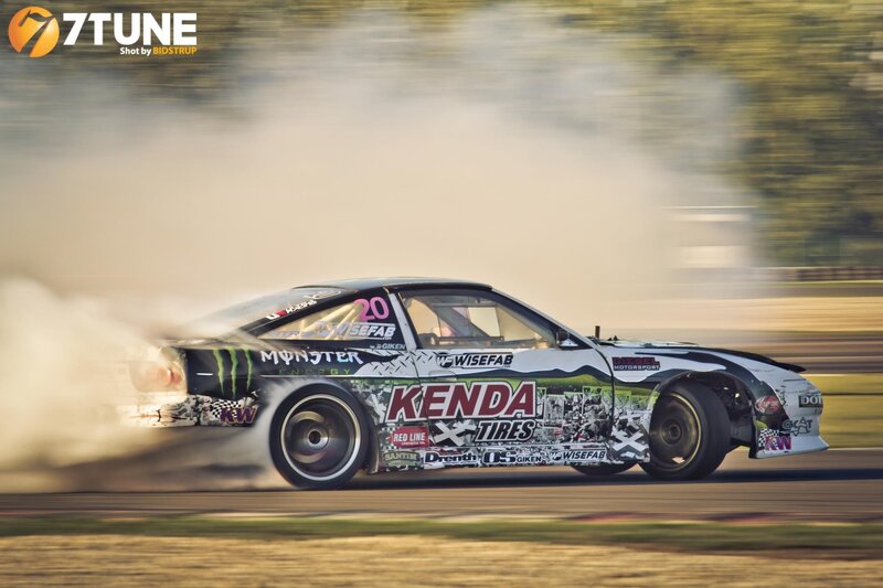 Drifting Race Car — White, Dynamic, Afternoon, Photograph, Smoke, Tires, Track