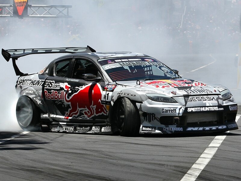 Drifting Race Car — White, Dynamic, Afternoon, Photograph