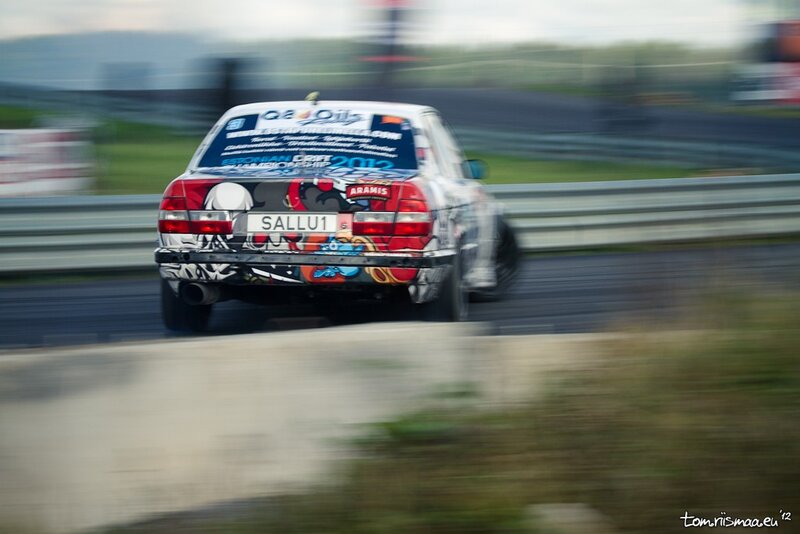Drifting Race Car — White, Dynamic, Photograph, Race Track