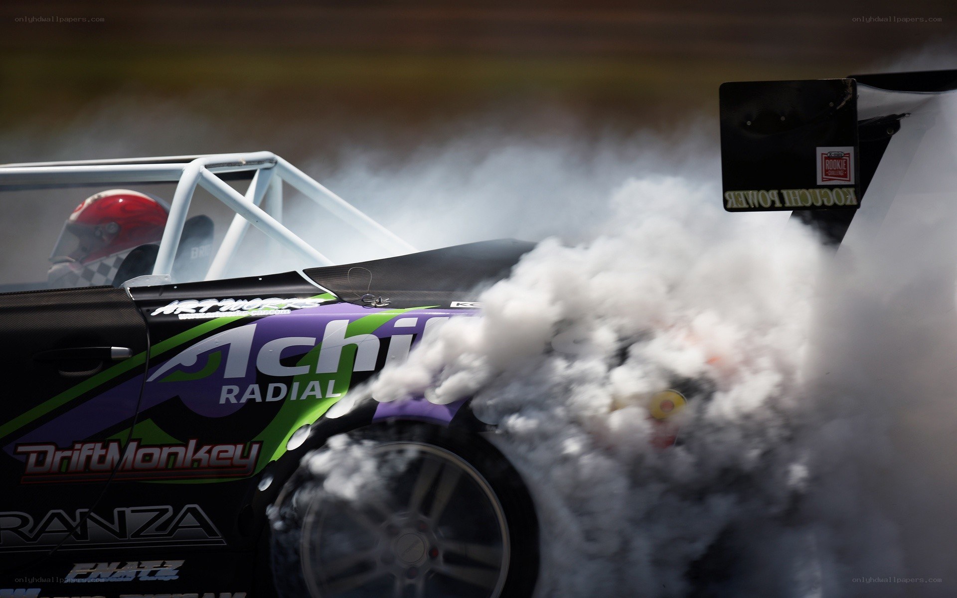 Drifting race car with smoke