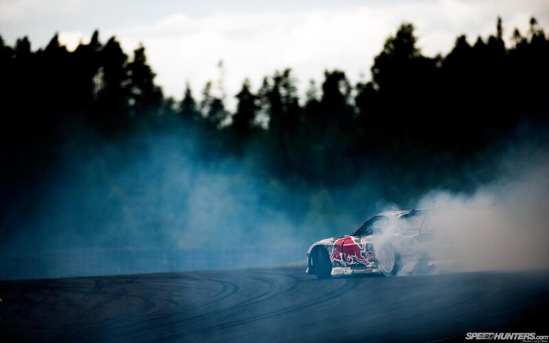 Drifting race car with smoke