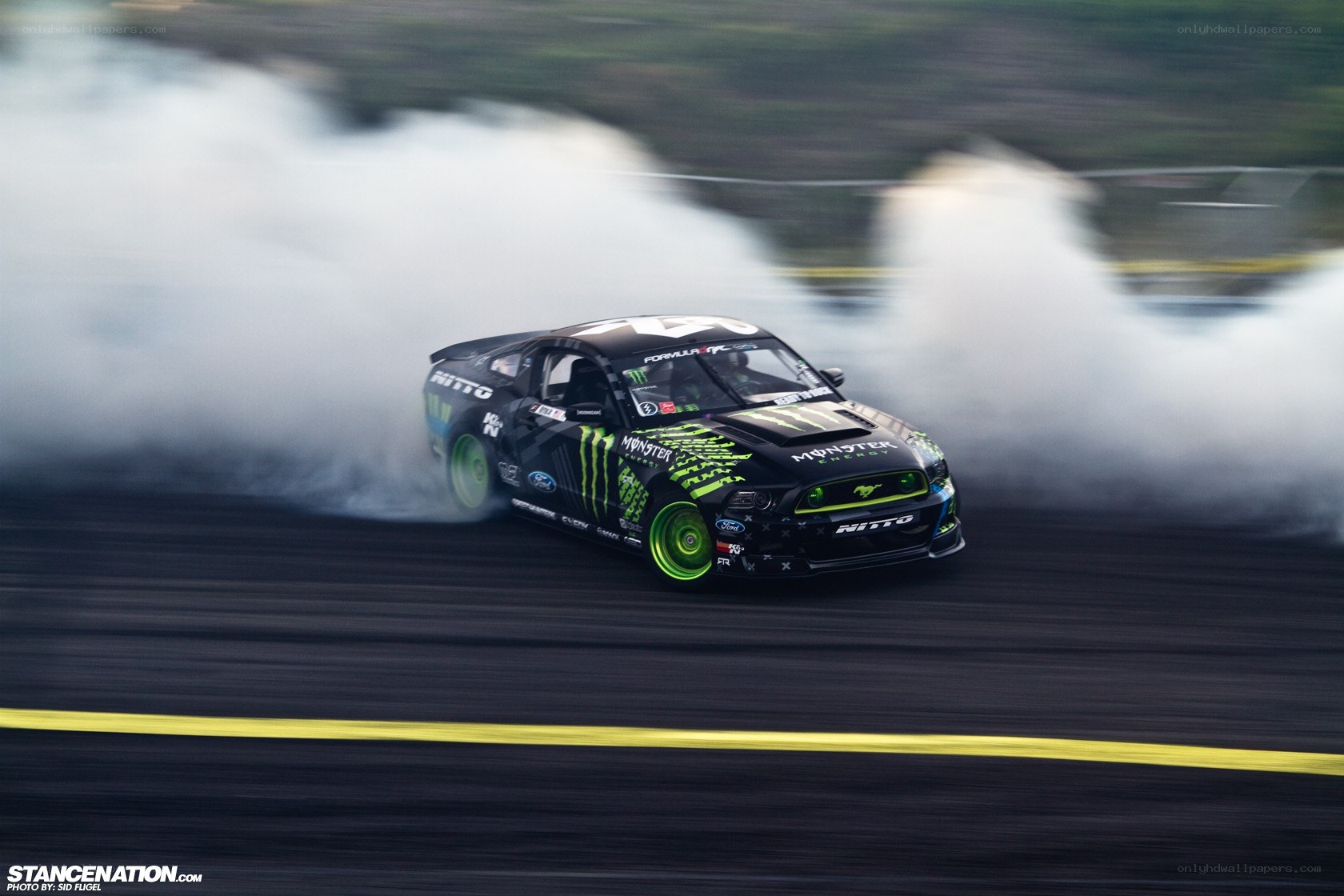 drifting race car with smoke