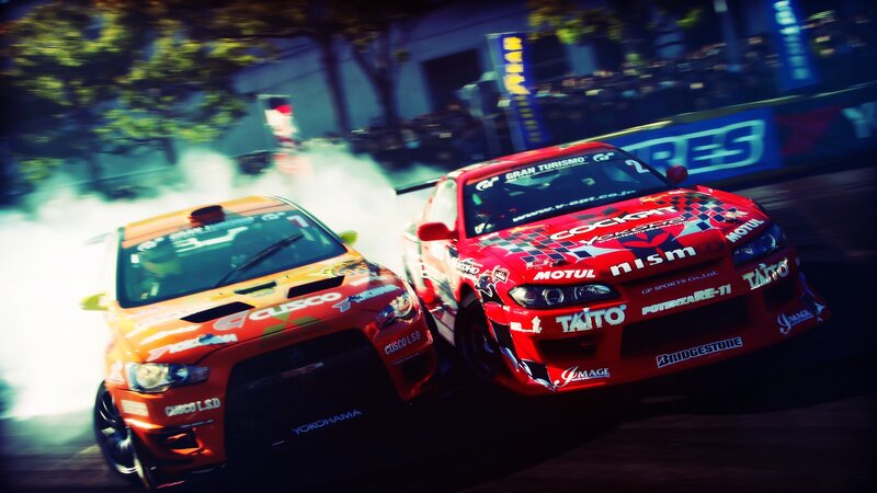 Drifting race cars at night