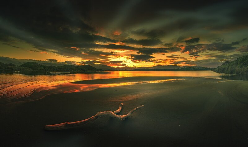 Driftwood on Beach — Orange, Dramatic, Sunset, Photograph, River