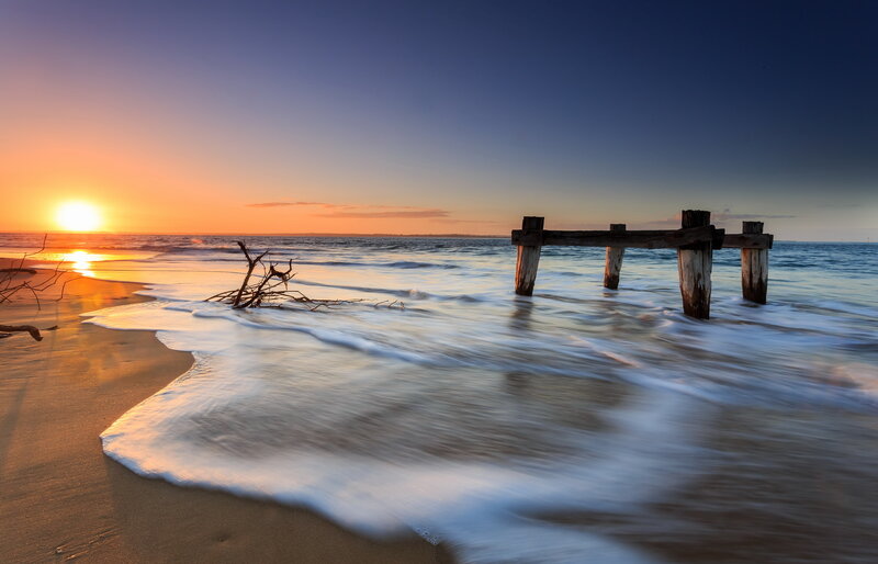 Driftwood on Beach — Orange, Serene, Sunset, Photograph, Sunrise
