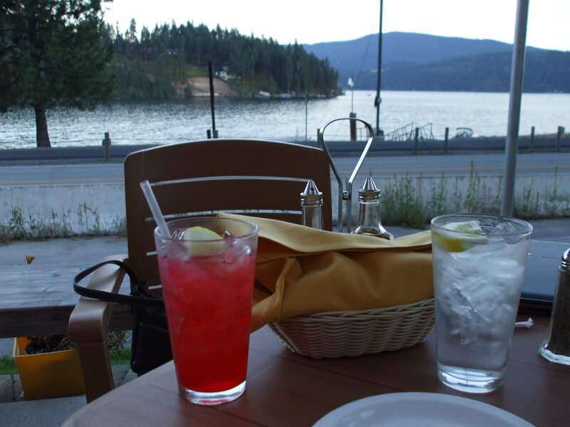 Drinks at a lakeside table