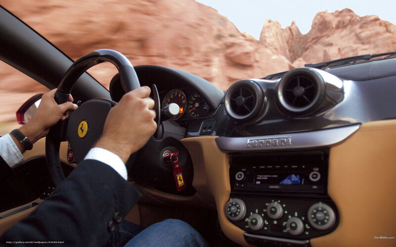Driver in a Ferrari sports car