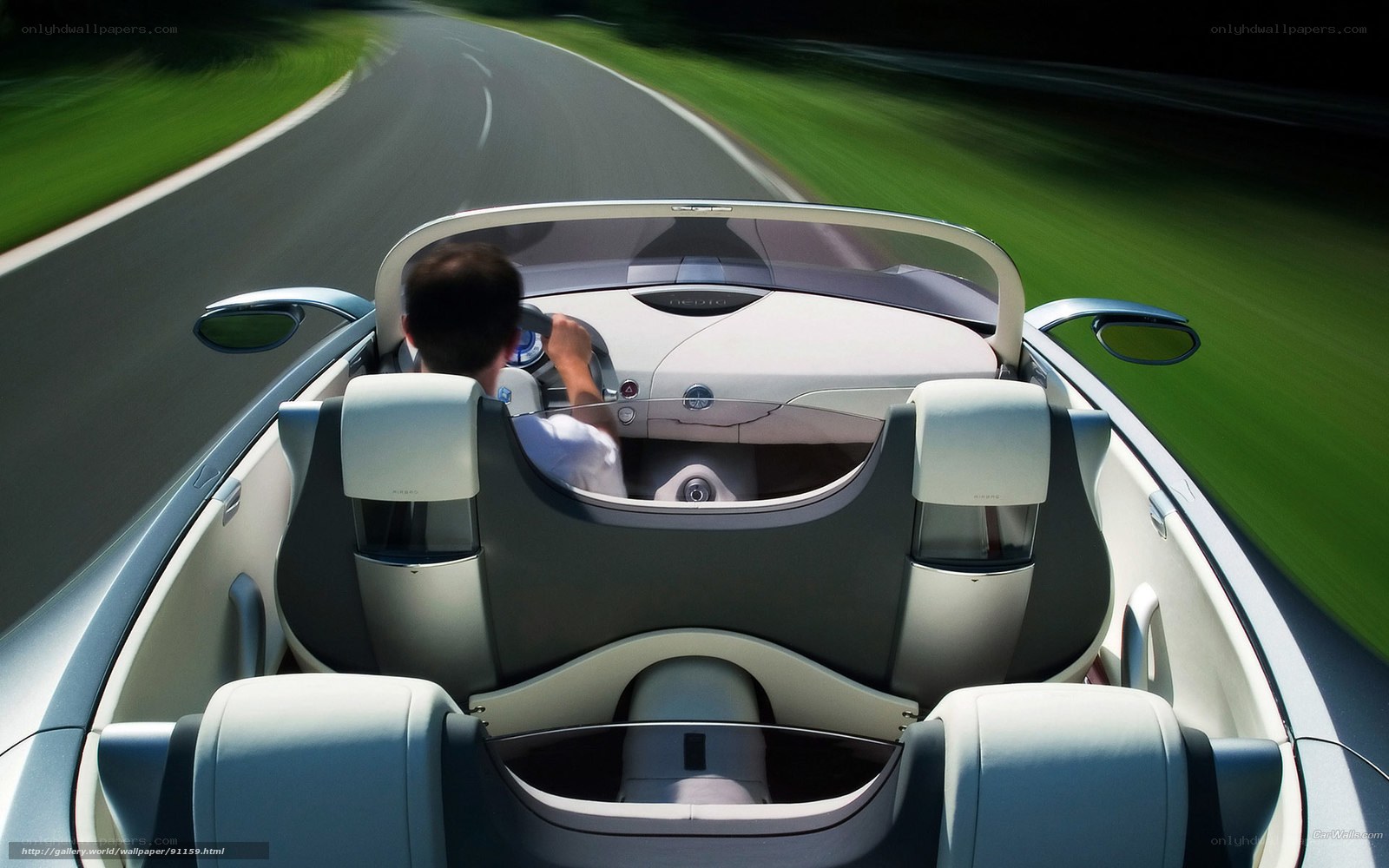 Driver in a futuristic convertible