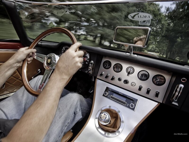 Driver in classic car interior