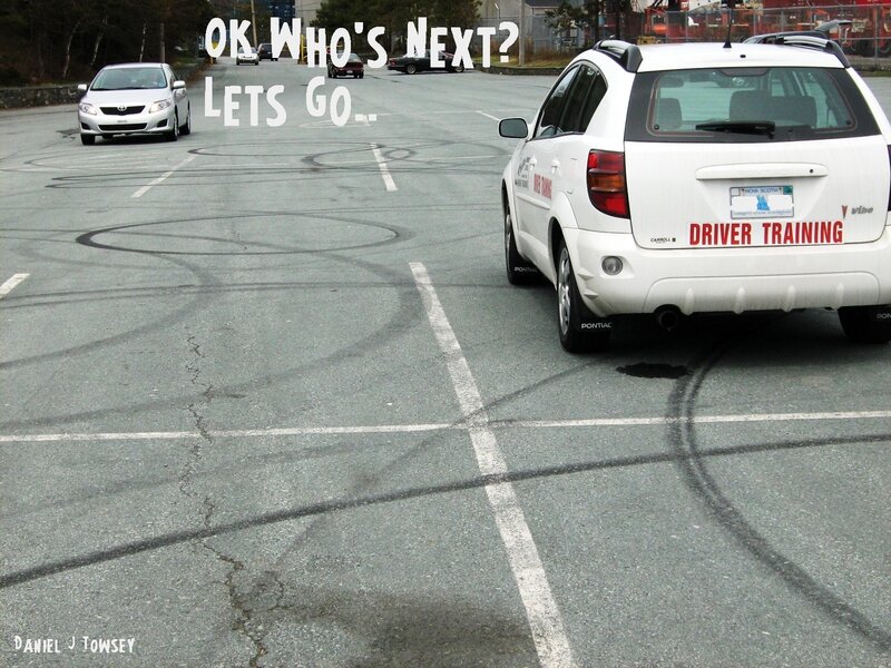 Driver training car in parking lot