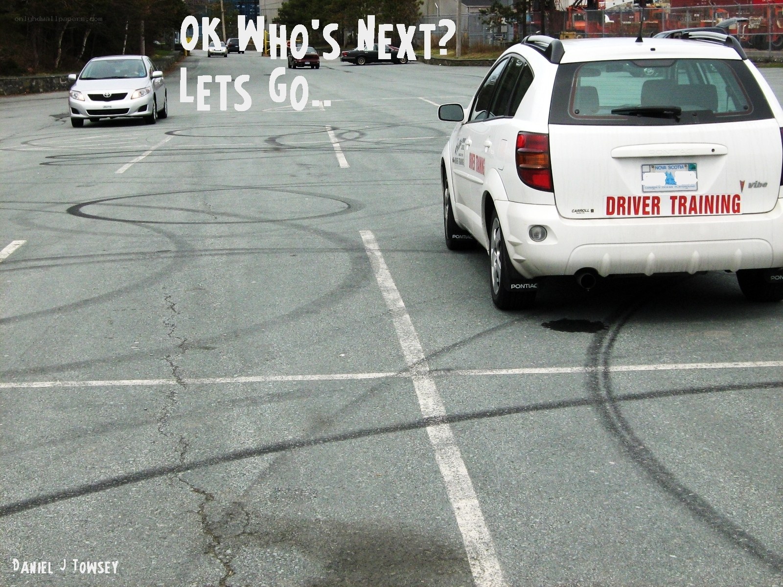 Driver training car in parking lot