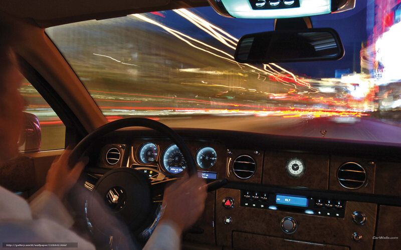 Driving a luxury car at night