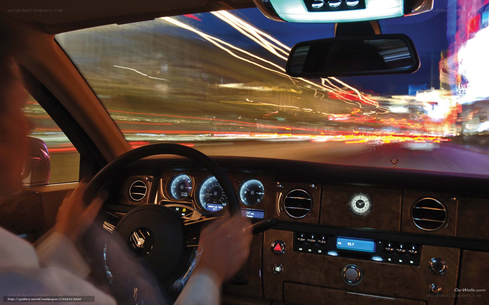 Driving a luxury car at night