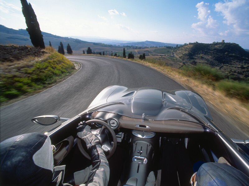 Driving a sports car on a winding road