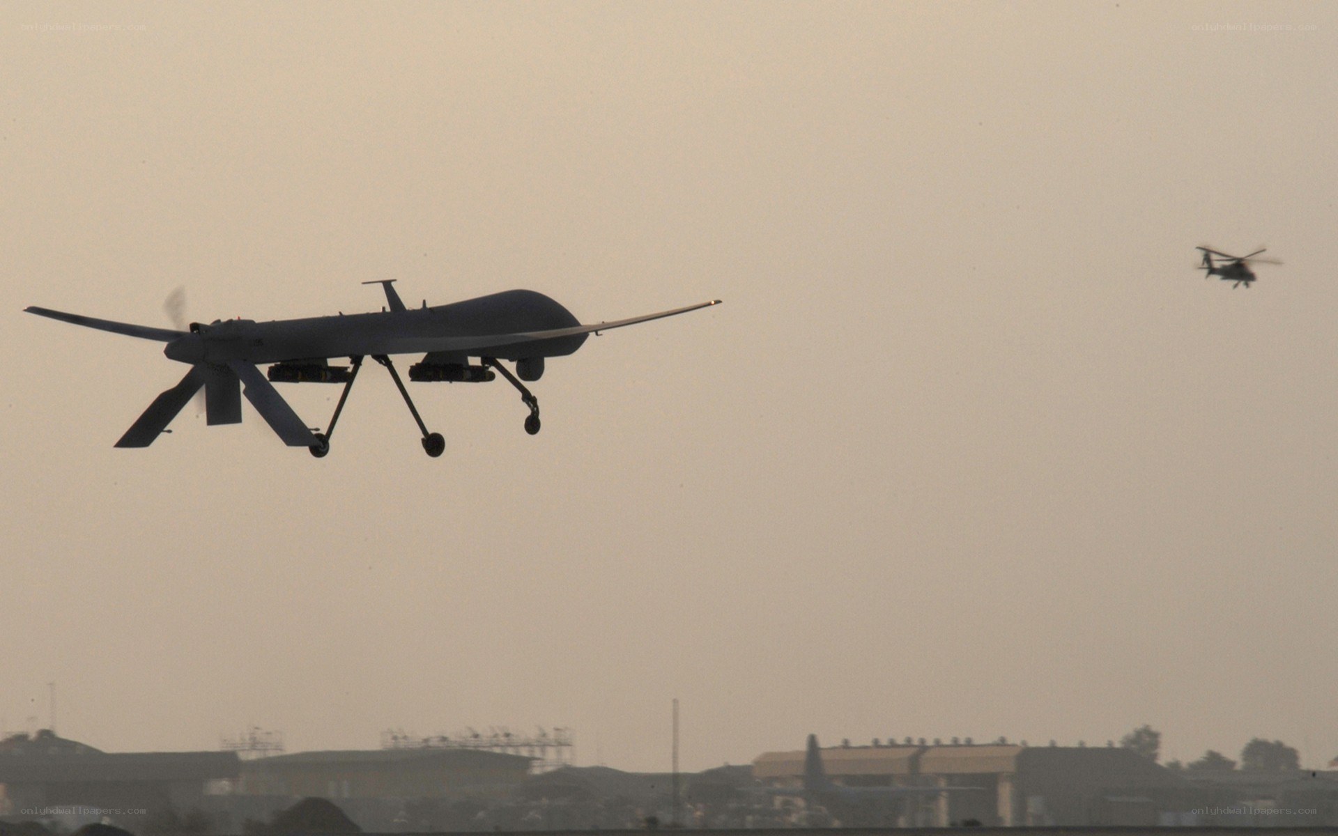 Drone and helicopter in flight