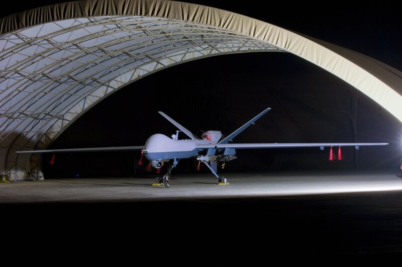 Drone in a hangar at night