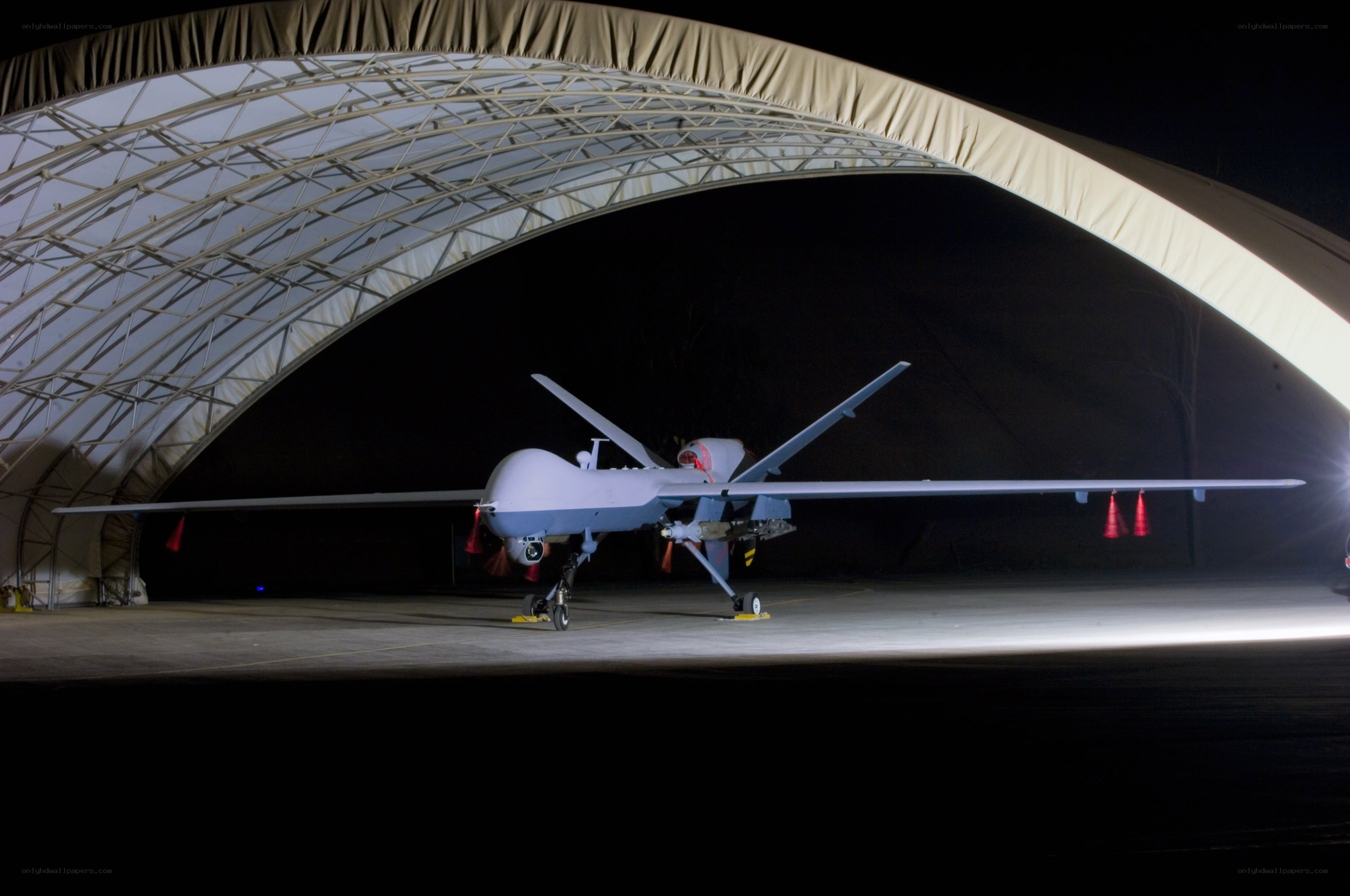 Drone in a hangar at night