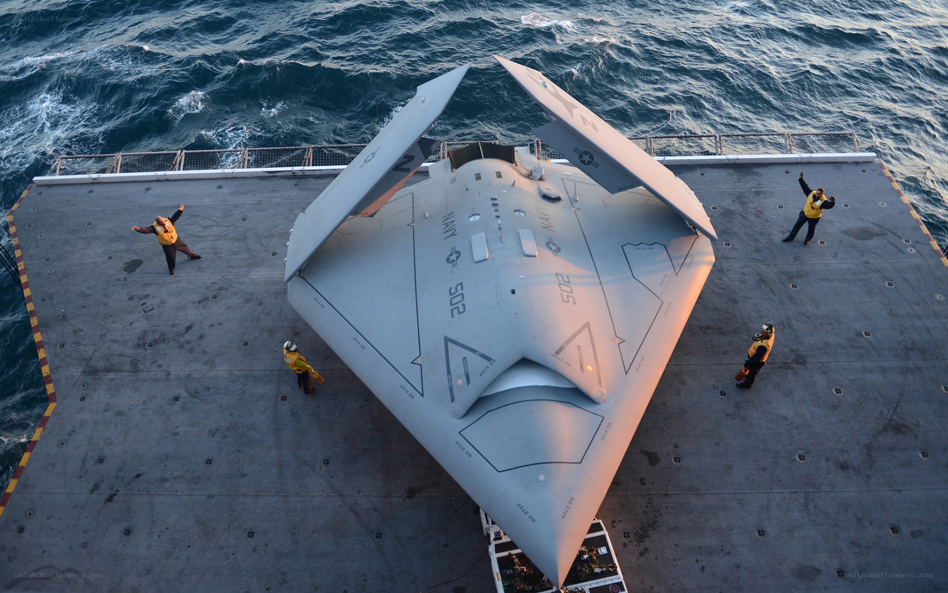 Drone on aircraft carrier deck