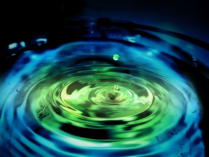 Droplet Creating Ripples — Green, Dramatic