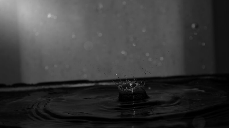 Droplet Hitting Water Surface — Black