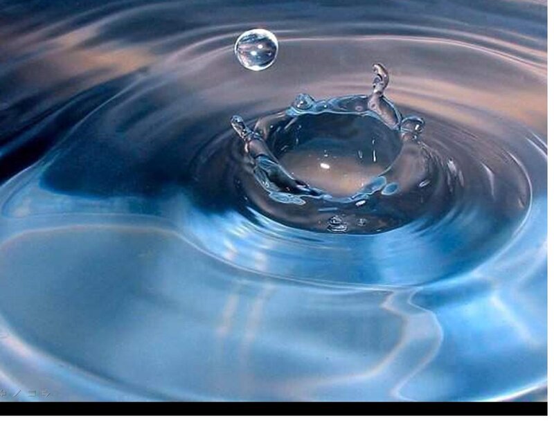 Droplet Hitting Water Surface — Blue, Calm