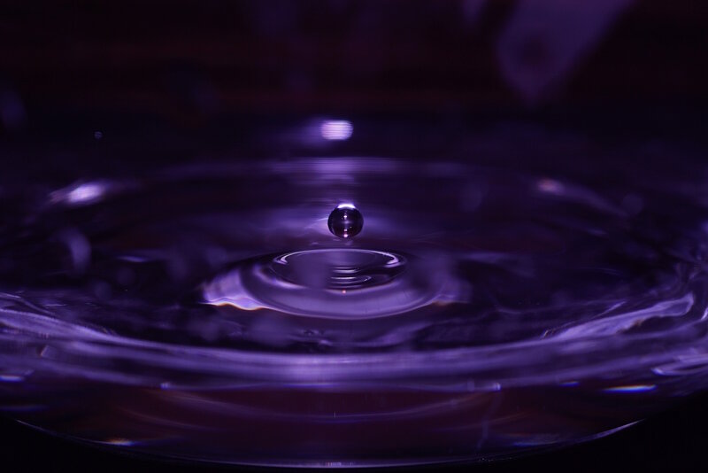 Droplet Hitting Water Surface — Purple