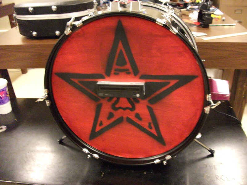 drum with red star design