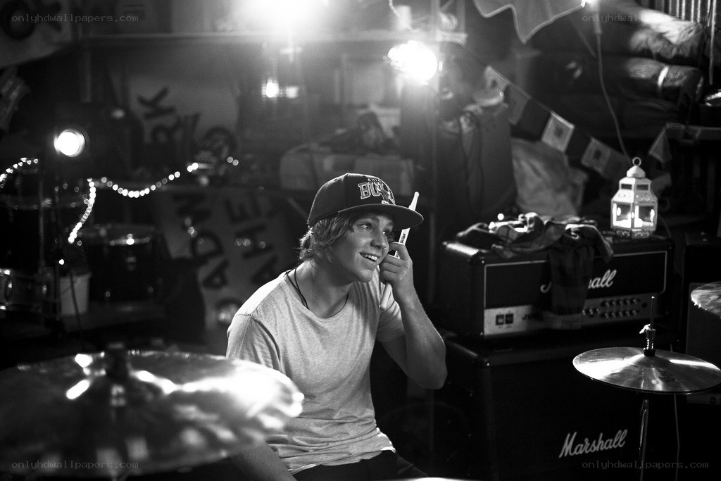 drummer on phone in studio