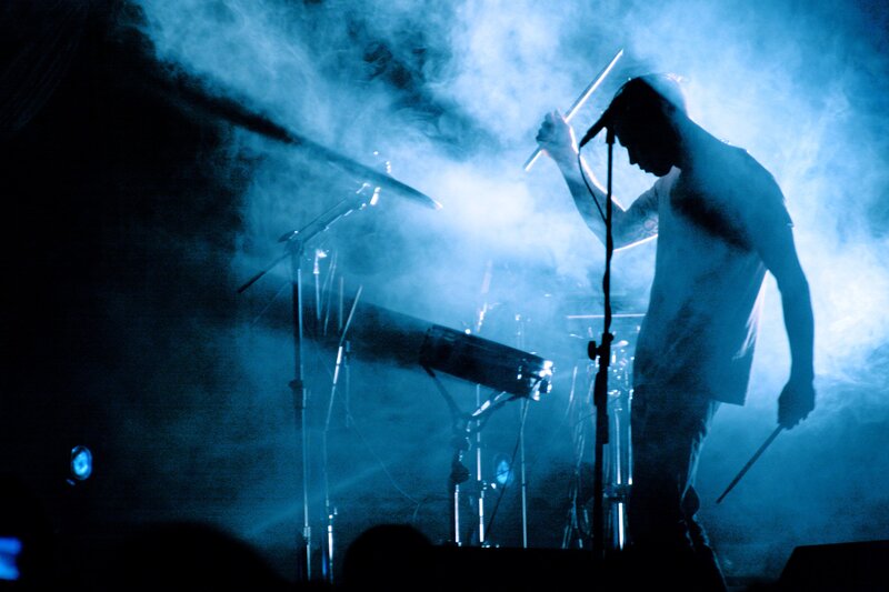 Drummer on Stage — Blue, Dramatic