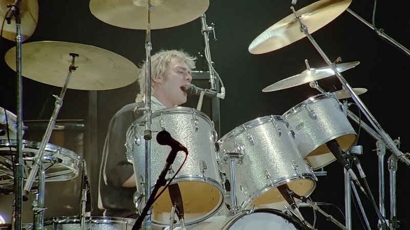 Drummer Performing on Stage — Silver