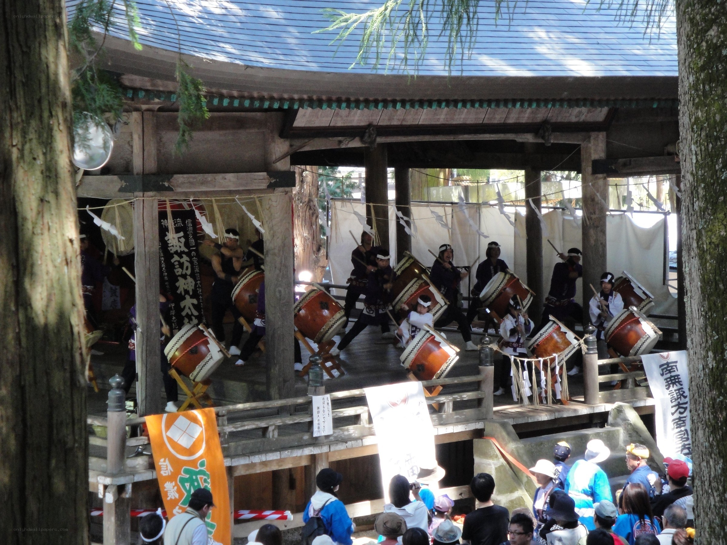 Drummers performing at a shrine