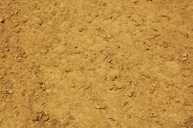 dry cracked earth with pebbles