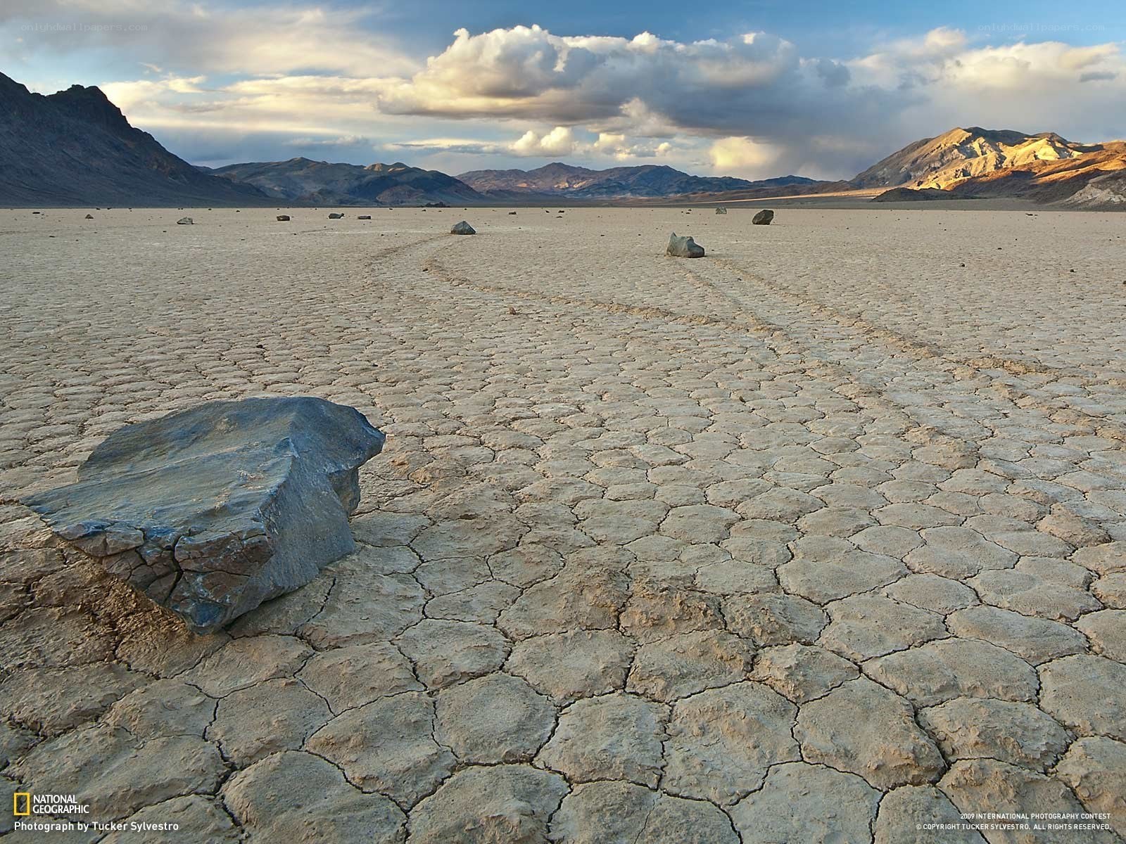Dry lake bed with moving rocks