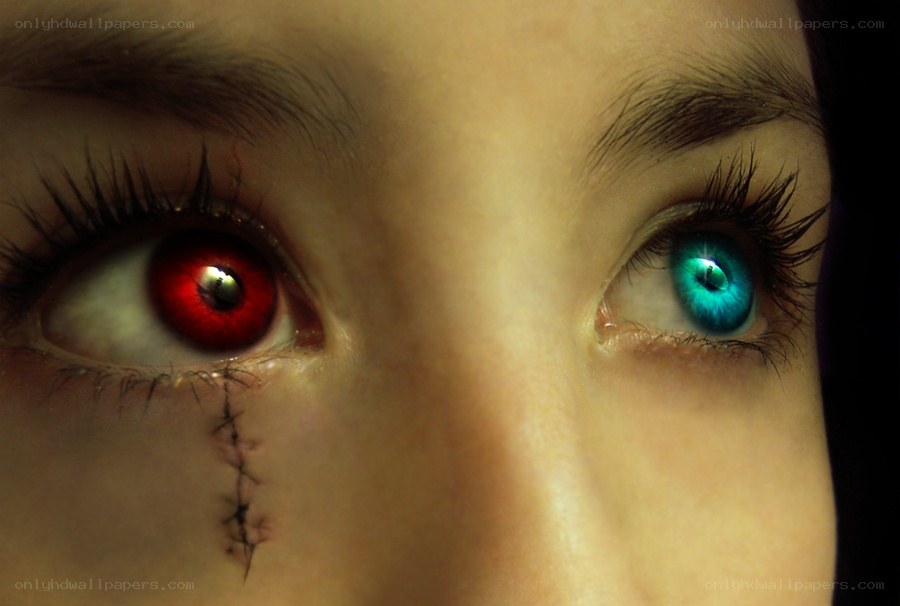 Dual-colored eyes with scar