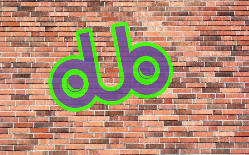 dub logo on brick wall