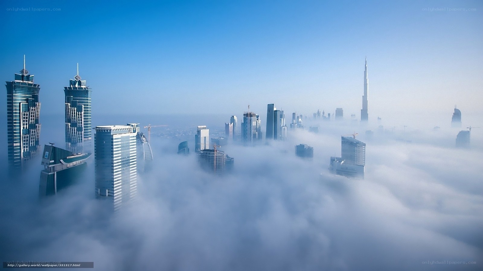 Dubai skyline above clouds