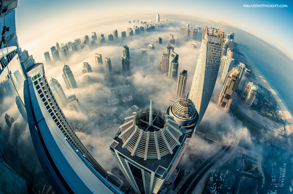 Dubai skyline above the clouds