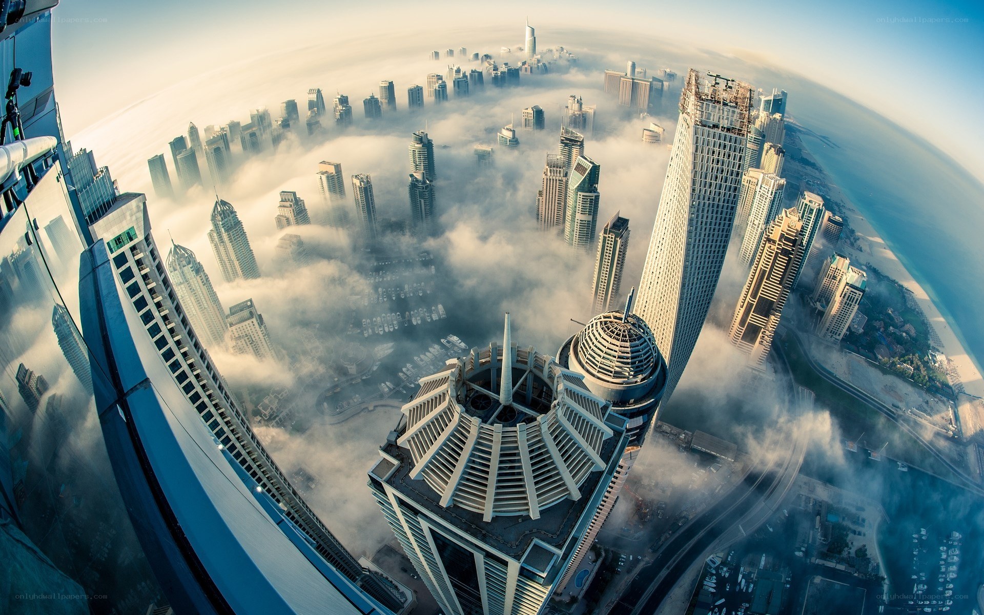 Dubai skyline above the clouds