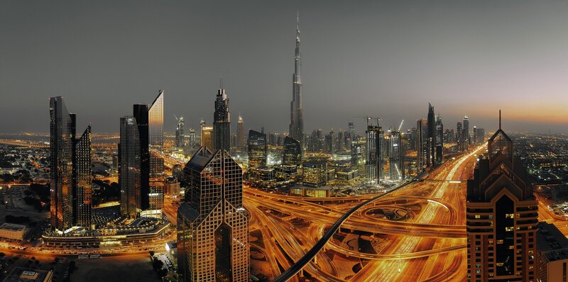 Dubai Skyline at Night — Black, Dramatic, Photograph, Skyscrapers, Highways, Traffic